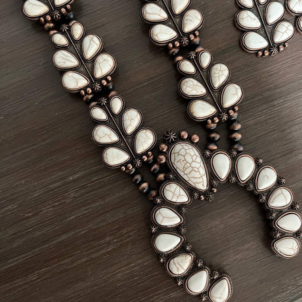 Squash blossom necklace and matching earring.